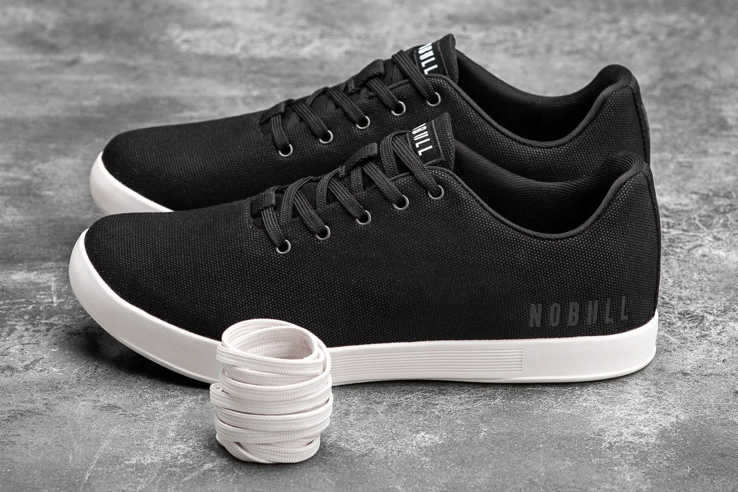 BLACK IVORY CANVAS TRAINER (WOMEN'S)