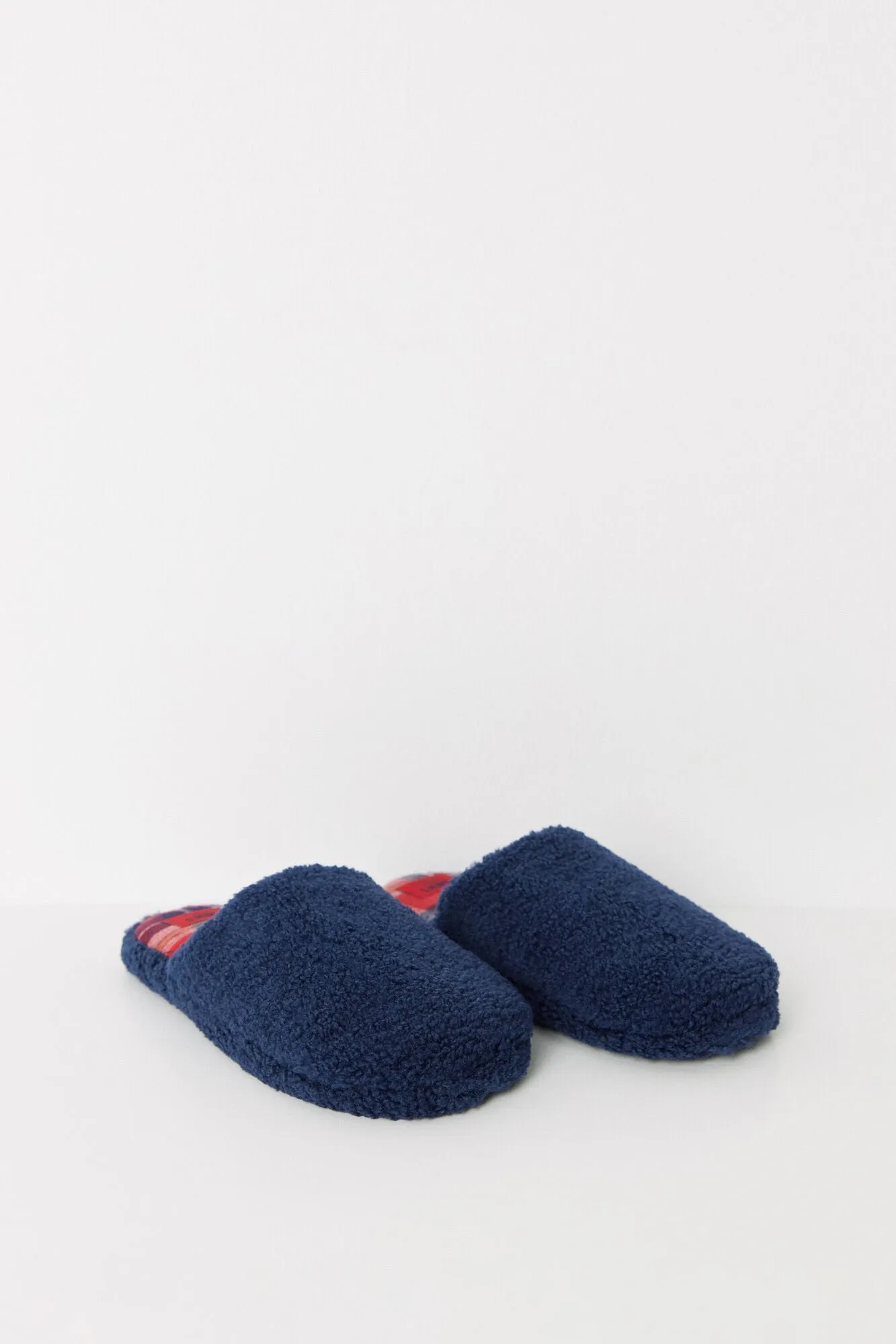 Navy blue faux shearling slippers