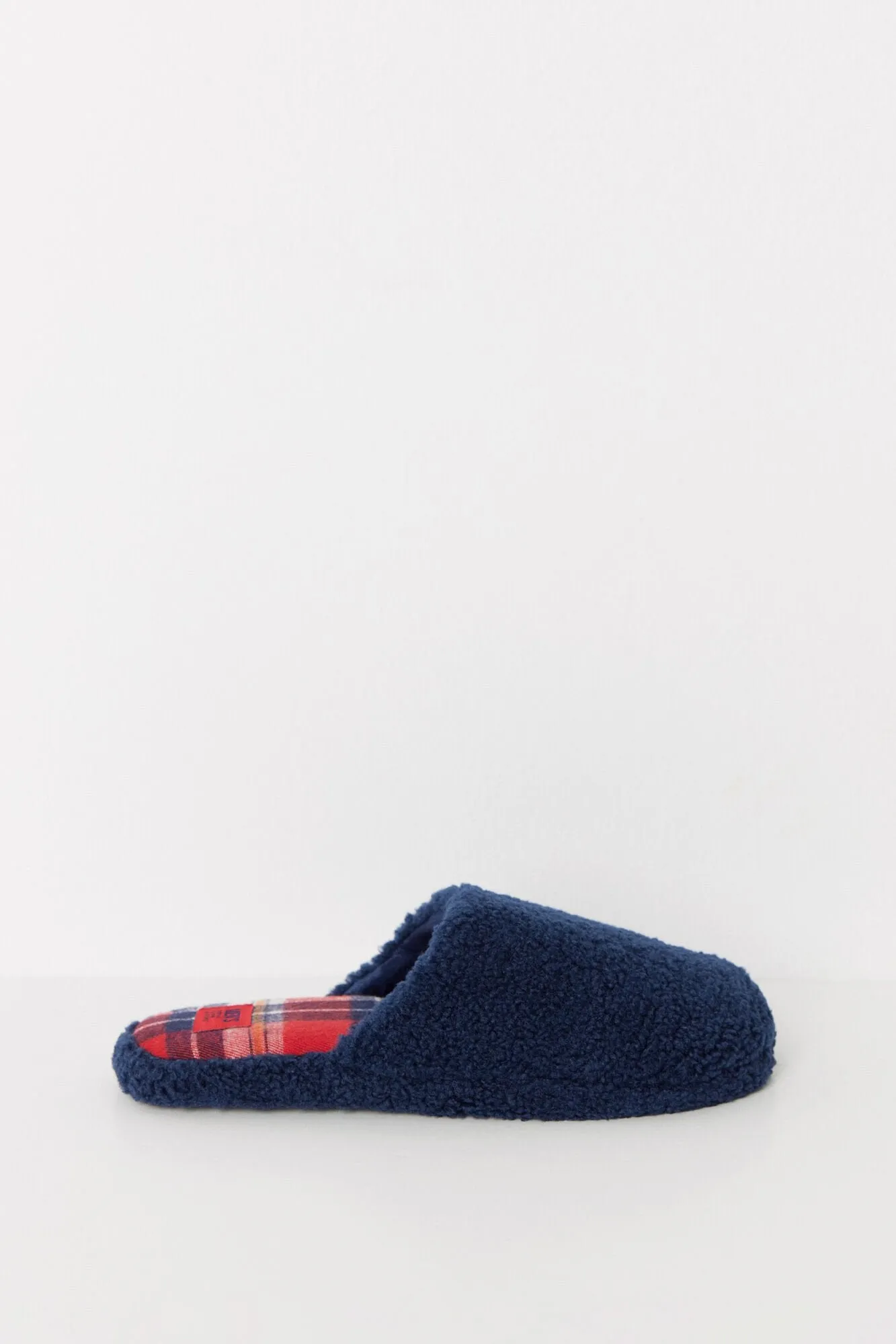 Navy blue faux shearling slippers